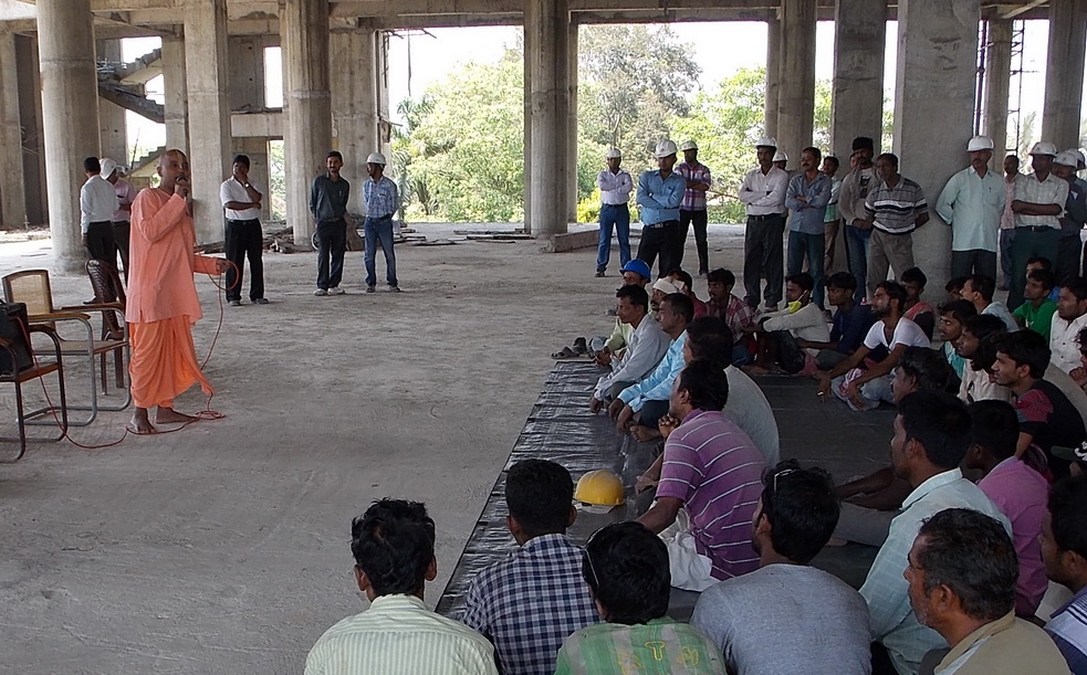 Brahma Samhita das is talking to laborers